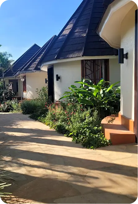 Luxury cottage exterior at Bustani Tulivu resort Western Kenya