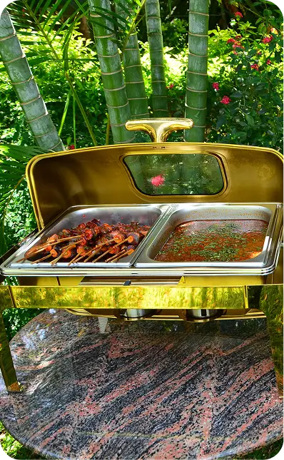 Outdoor buffet dining at Bustani Tulivu garden restaurant Western Kenya