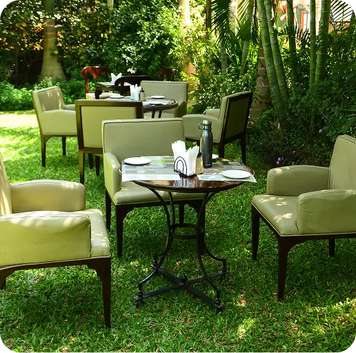 Garden dining area at Bustani Tulivu resort Bungoma County