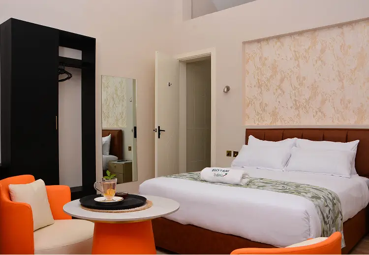 Comfortable cottage bedroom at Bustani Tulivu Bungoma